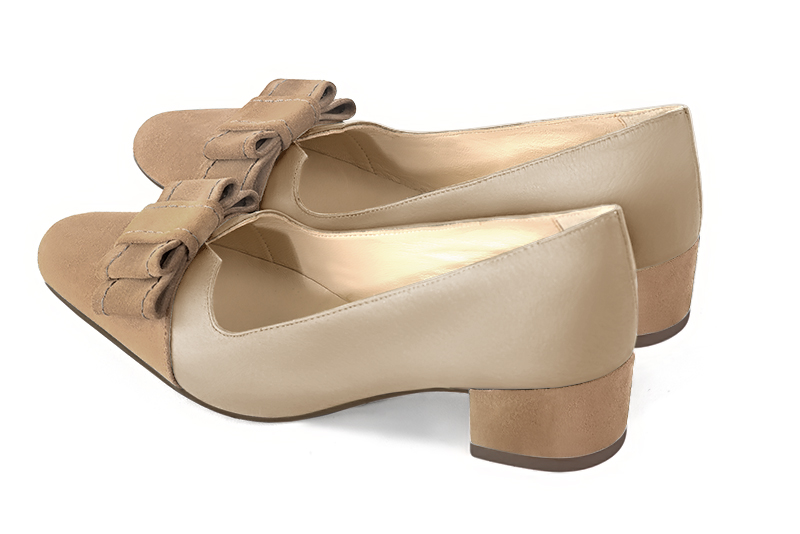 Tan beige women's dress pumps, with a knot on the front. Round toe. Low block heels. Rear view - Florence KOOIJMAN